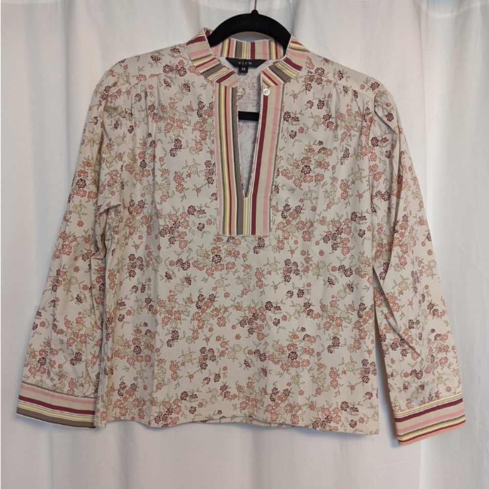 Floral top with contrasting stripe trim detail